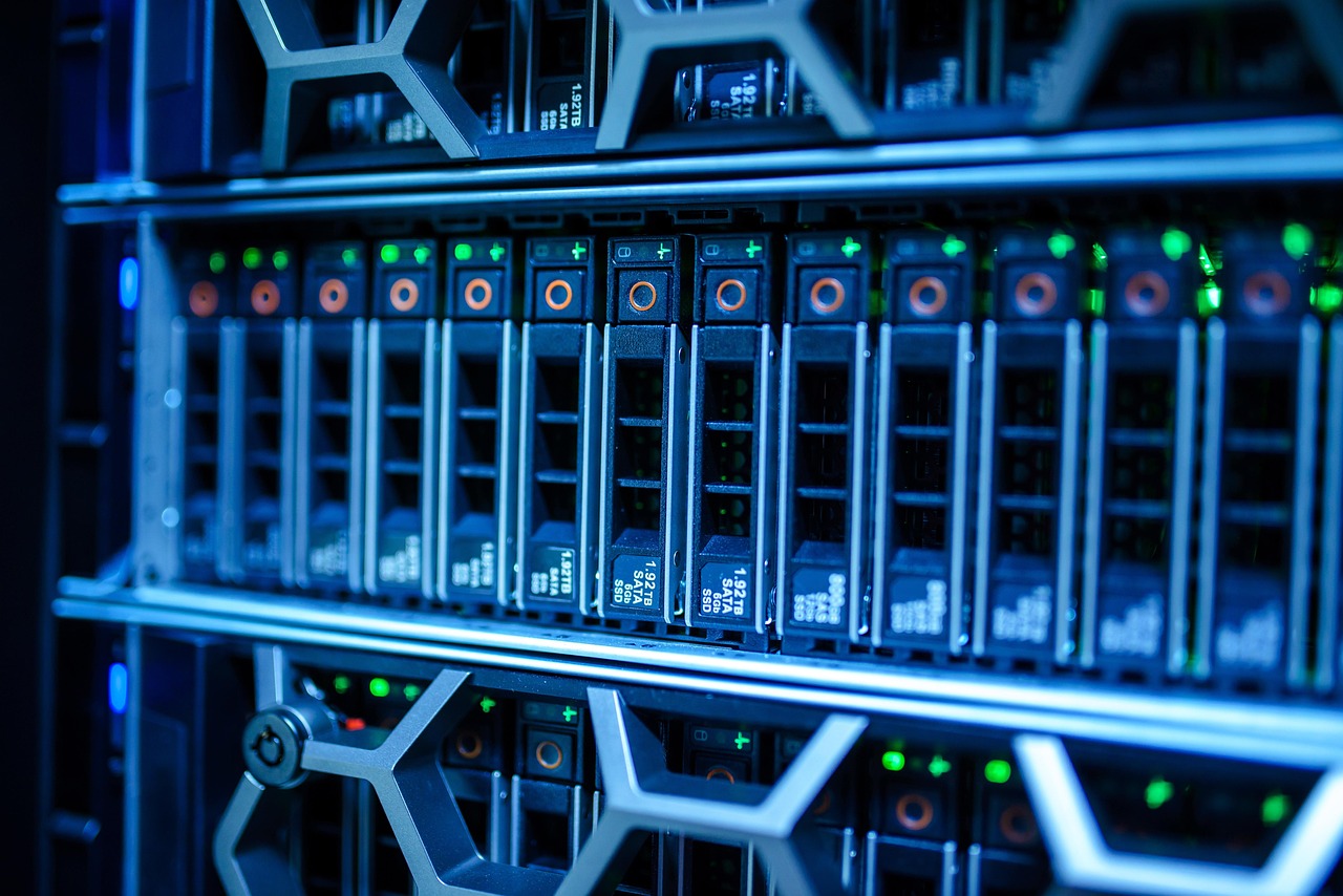 A close-up of a server's drive bays filled with 1.92TB SATA SSDs under blue lighting